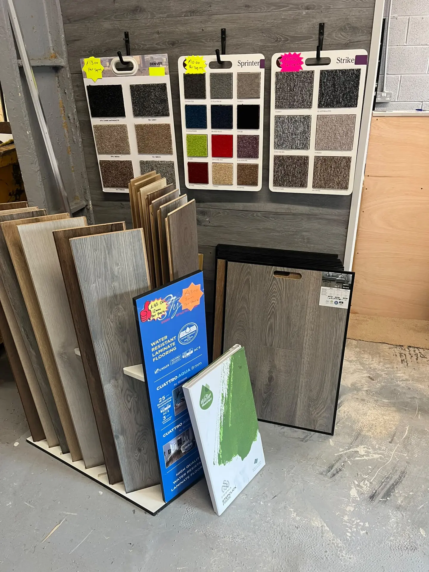 Carpet swatches and laminate boards to compare side by side